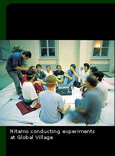 Nitamo conducting experiments at Global Village